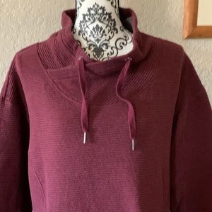 Burgundy pullover sweatshirt.
